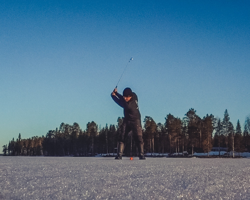 13.5.2020 Man golfing on ice in Finland