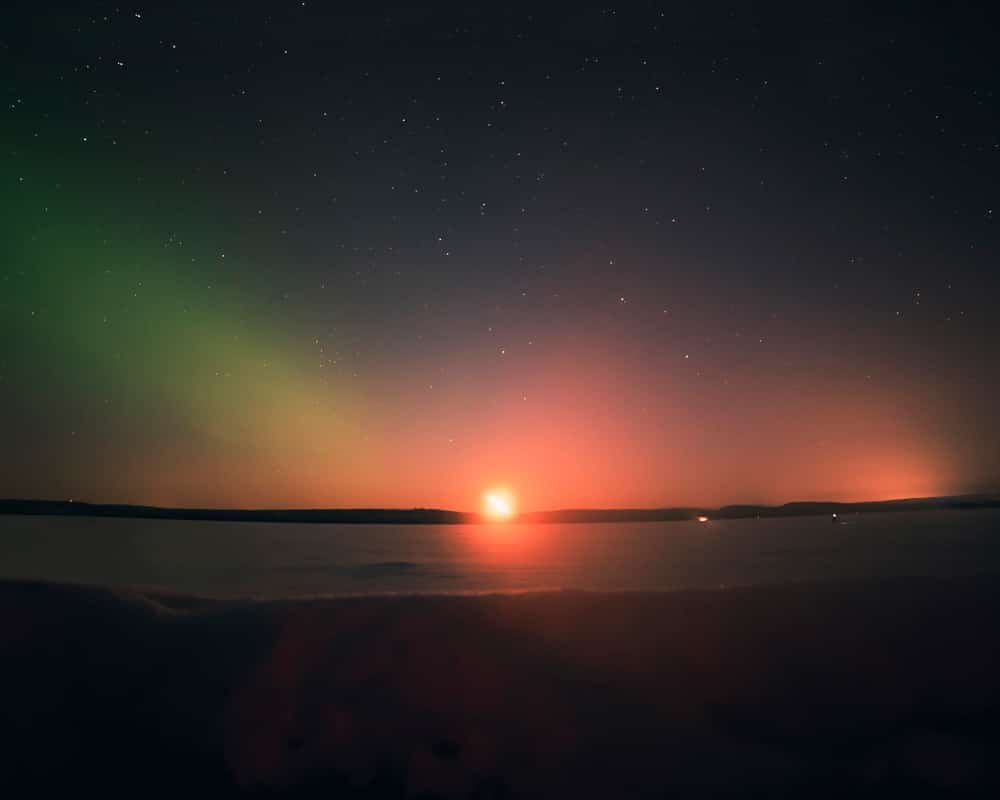 Moonrise with northern lights at Raanujärvi.