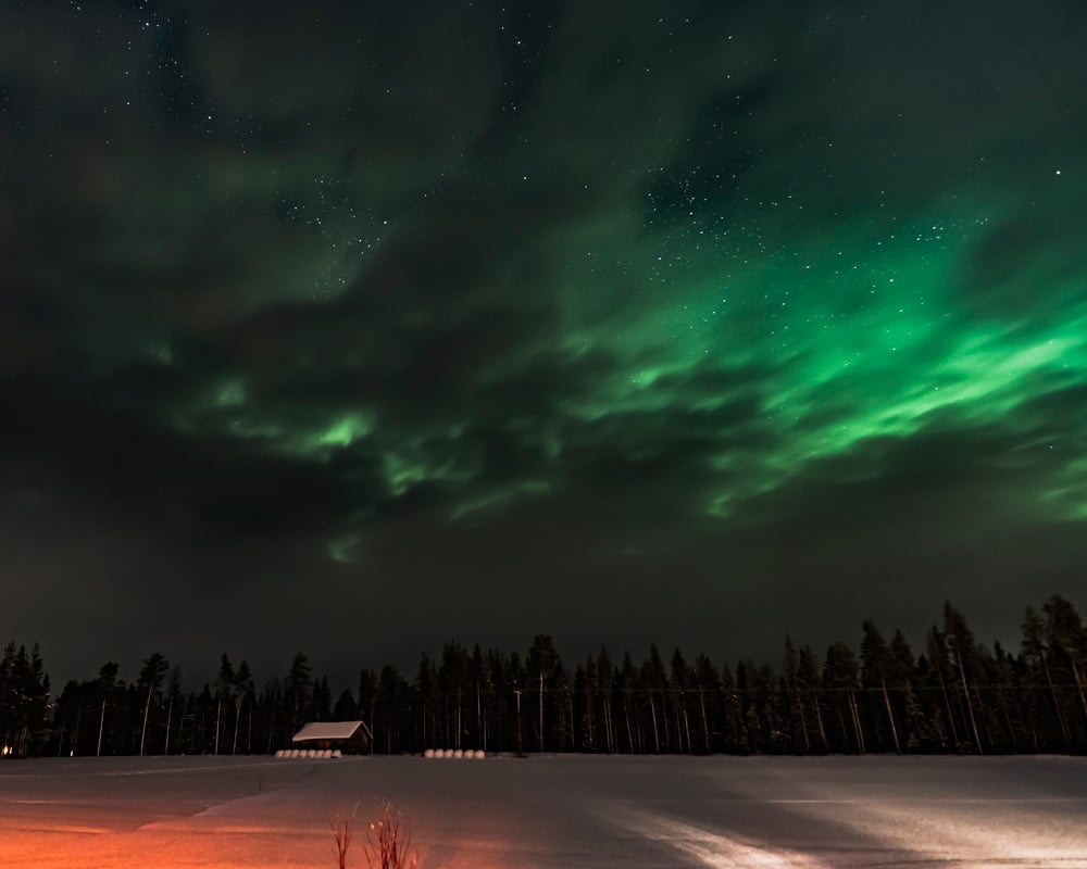 23.1.2020 northern lights behind the clouds.