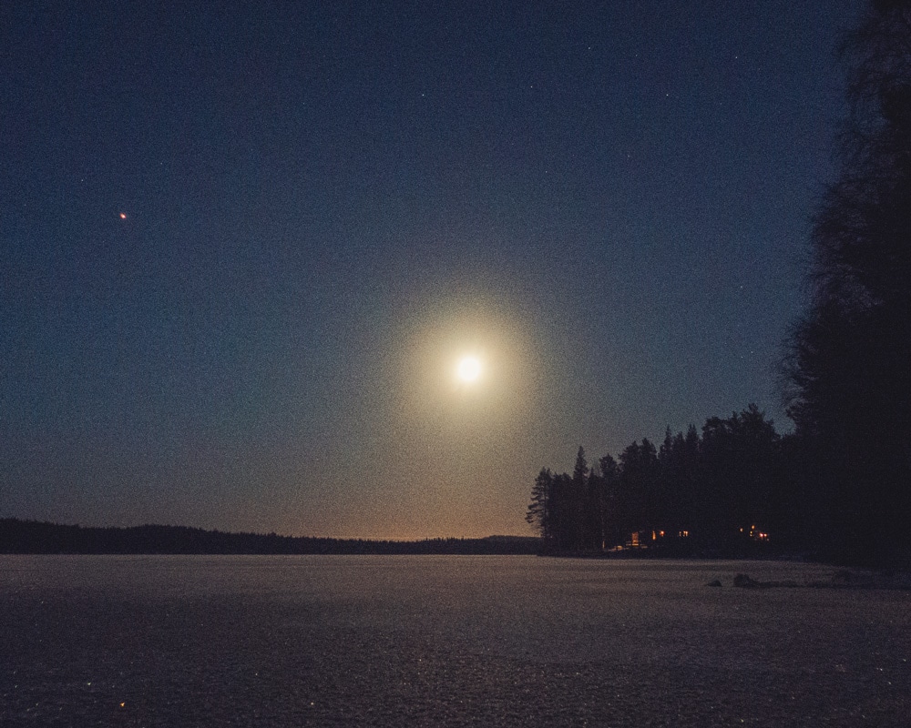 24.11.2020 Frozen lake under the moonlight.