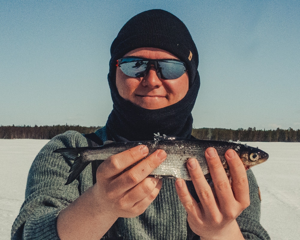 1.5.2020 Man holding a whitefish.