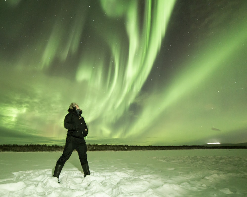 8.1.2022-sinettä 8.1.2022 Northern lights hunting on frozen river Sinettä, Lapland.