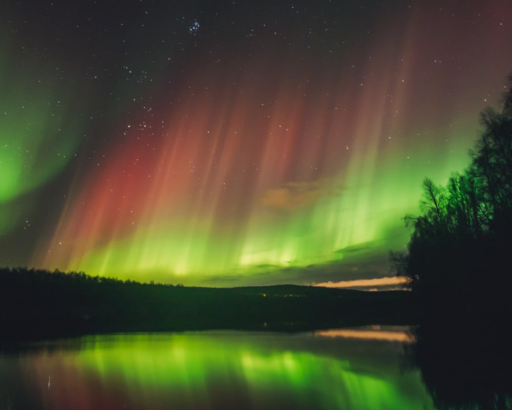 22.10.2022 Red northern lights at Ounasjoki Lapland.